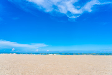 Fototapeta na wymiar Beautiful tropical nature landscape of beach sea and ocean with white cloud blue sky