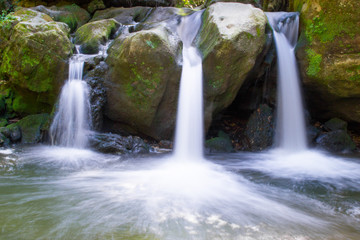 Long exposure picture of Schiessentümpel or Schéissendëmpel Waterfall in Mullerthal, Luxembourg
