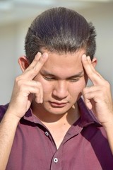 Fototapeta premium Stressed Handsome Filipino Adult Male