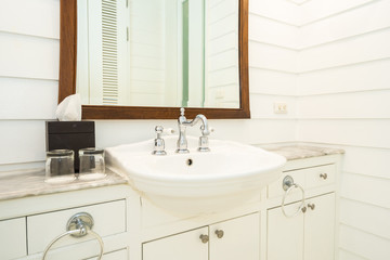 White sink and water tap faucet