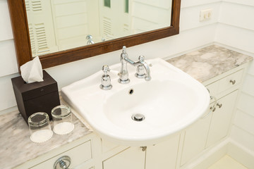 White sink and water tap faucet