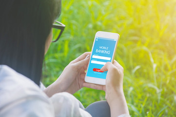 Female using mobile smartphone. Concept online payment for appplication mobile banking