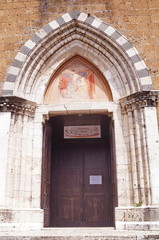 Fototapeta na wymiar Entrance door of San Domenico church, Orvieto, Italy