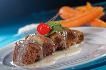 Carrot cake with condensed milk and cherry