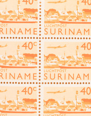 Suriname - CIRCA 1970: A stamp printed in Suriname shows a city, circa 1970