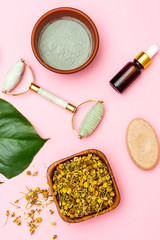 Organic skin care product on pink bacground. Vertical