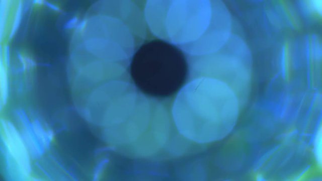 4K Abstract technology neon lines tunnel. Camera rotates and moves forward towards the white light. Dynamic background for project.