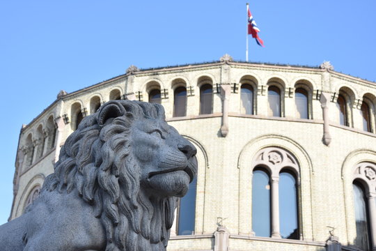 Lion statue next Norwegian parliament Storting Oslo in central Oslo, Norway - Image