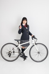 制服で自転車に乗る女子高生　high school girl