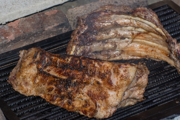 Obraz na płótnie Canvas pork bone on the grill