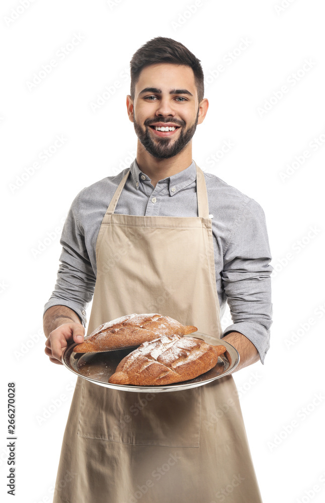 Wall mural baker with fresh bread on white background