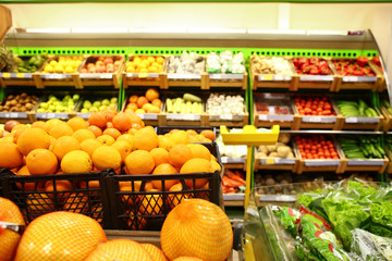 Various fresh fruits and vegetables in supermarket