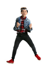Jumping little boy on white background