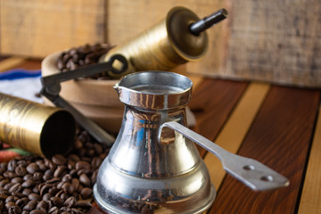 Coffee ready to be milled with old grinder