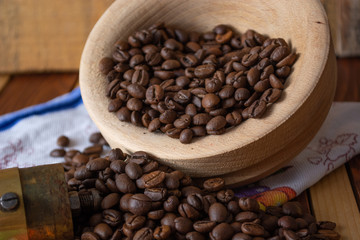 Coffee ready to be milled with old grinder