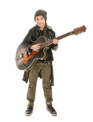 Cool little boy with guitar on white background