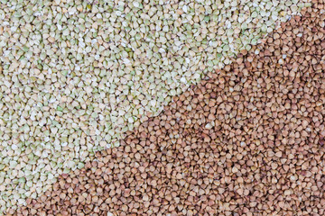 Background of uncooked pre-steamed and not steamed buckwheat groats