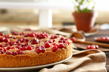 Tasty cranberry pie on table, closeup