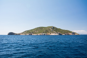 Neos Marmaras, Halkidiki, Greece - June 29, 2014: Kalymentos Island Turtle, uninhabited island near the peninsula of Chalkidiki