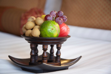 fruit basket on bed