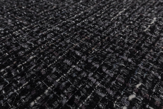 Close up of dark fabric with textile textule background