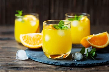 Schilderijen op glas Fresh summer cocktail with orange and mint © nolonely