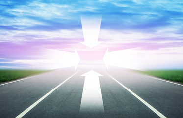Background of blurred asphalt road, clear blue sky with clouds. Sunlit skyline