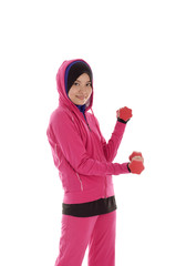 Young Muslimah holding dumb bell for excercise