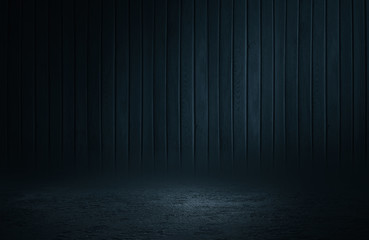 Background of empty dark street. Old brick wall, concrete floor. A spotlight at night illuminates an empty old wall. Smoke, fog