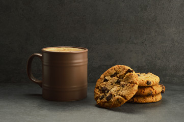 Chocolate chip cookies with cup of coffee