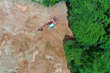 Deforestation. Logging and forestry. Rainforest jungle in Southeast Asia destroyed to make way for...