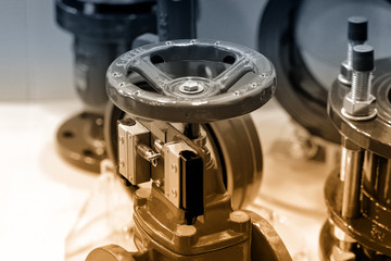 Industrial valves, manual valves. Brown toned