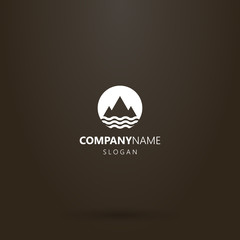 white logo on a black background. simple vector geometric negative space round logo of a mountain range over the waves of water