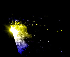 flash of light with sparks on a black background