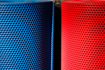 Colorful and perforated plastic grid.