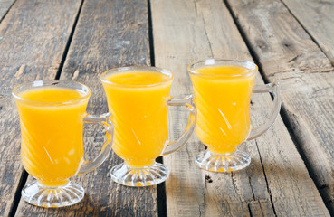 Healthy pumpkin fruit smoothie on  wooden table