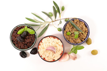 assorted of tapenade isolated on wood background