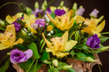 Yellow orchid bouquet in a box