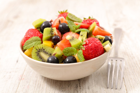mixed fruit salad with strawberry, grape, kiwi and banana