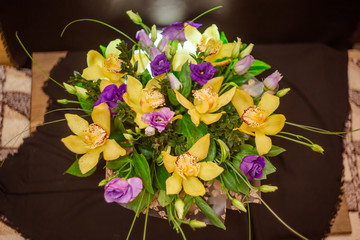 Yellow orchid bouquet in a box