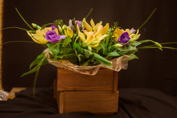 Yellow orchid bouquet in a box