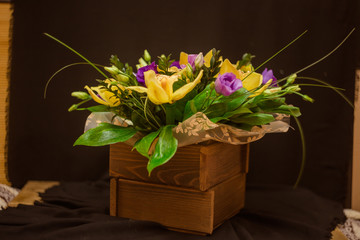 Yellow orchid bouquet in a box