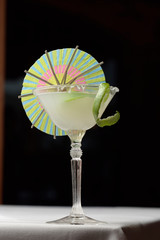 The martini is a cocktail made with gin and vermouth, and garnished with an olive or a lemon twist. Over the years, the martini has become one of the best-known mixed alcoholic beverages.