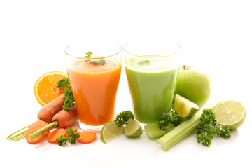 glasses of vegetable smoothie isolated on white background