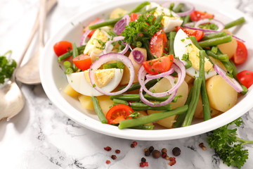 vegetable salad with egg, potato, bean and onion