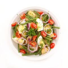 vegetable salad with egg, potato, bean and onion isolated on white background
