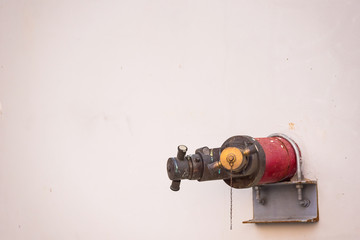 Fire Hydrants On The Wall.Thailand.