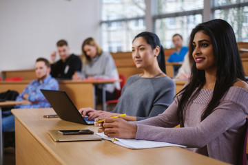 Multinational group of students in an auditorium