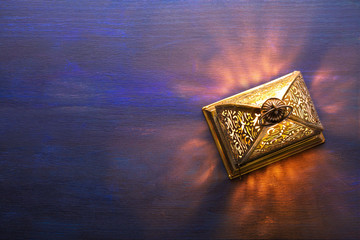 Ramadan  lantern on dark blue  wooden background.  Ramadan background.