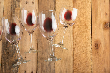 Flat lay red wine in glasses on wooden background with space, Concept of wine distillation, winery,...
